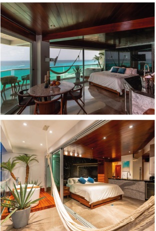 Wake up to the Caribbean — Villa Quarry’s bedroom blends modern luxury with breathtaking ocean views and tropical tranquility. | Despierta frente al Caribe — la habitación de Villa Quarry combina lujo moderno con impresionantes vistas al mar y tranquilidad tropical.
