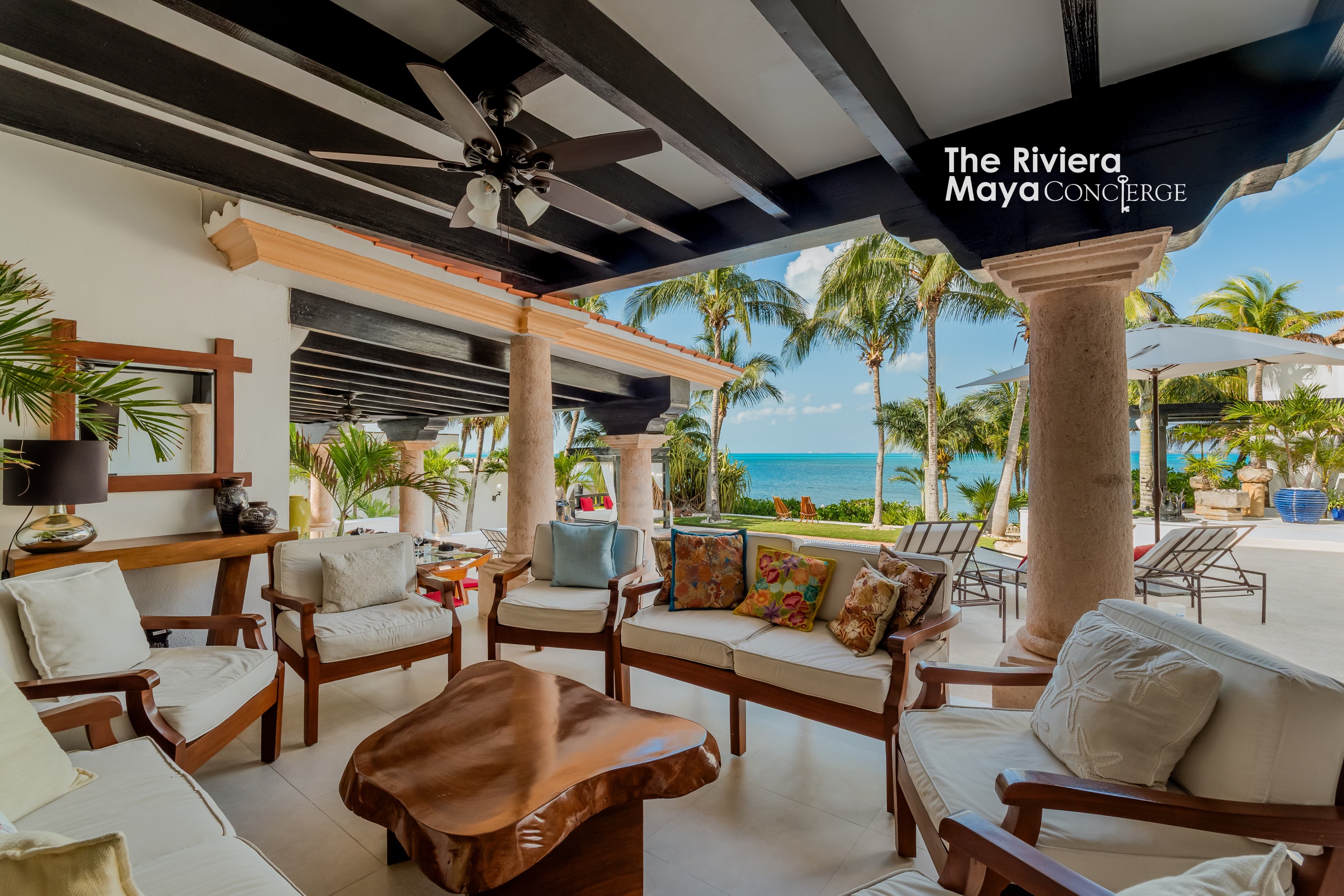 Ocean-view terrace with elegant lounge area overlooking the turquoise Caribbean — Villa Albatros, part of I Live Where You Vacation’s Riviera Maya luxury villa collection. | Terraza con vista al mar y área lounge elegante con vista al Caribe turquesa — Villa Albatros, parte de la colección de lujo Riviera Maya de I Live Where You Vacation.
