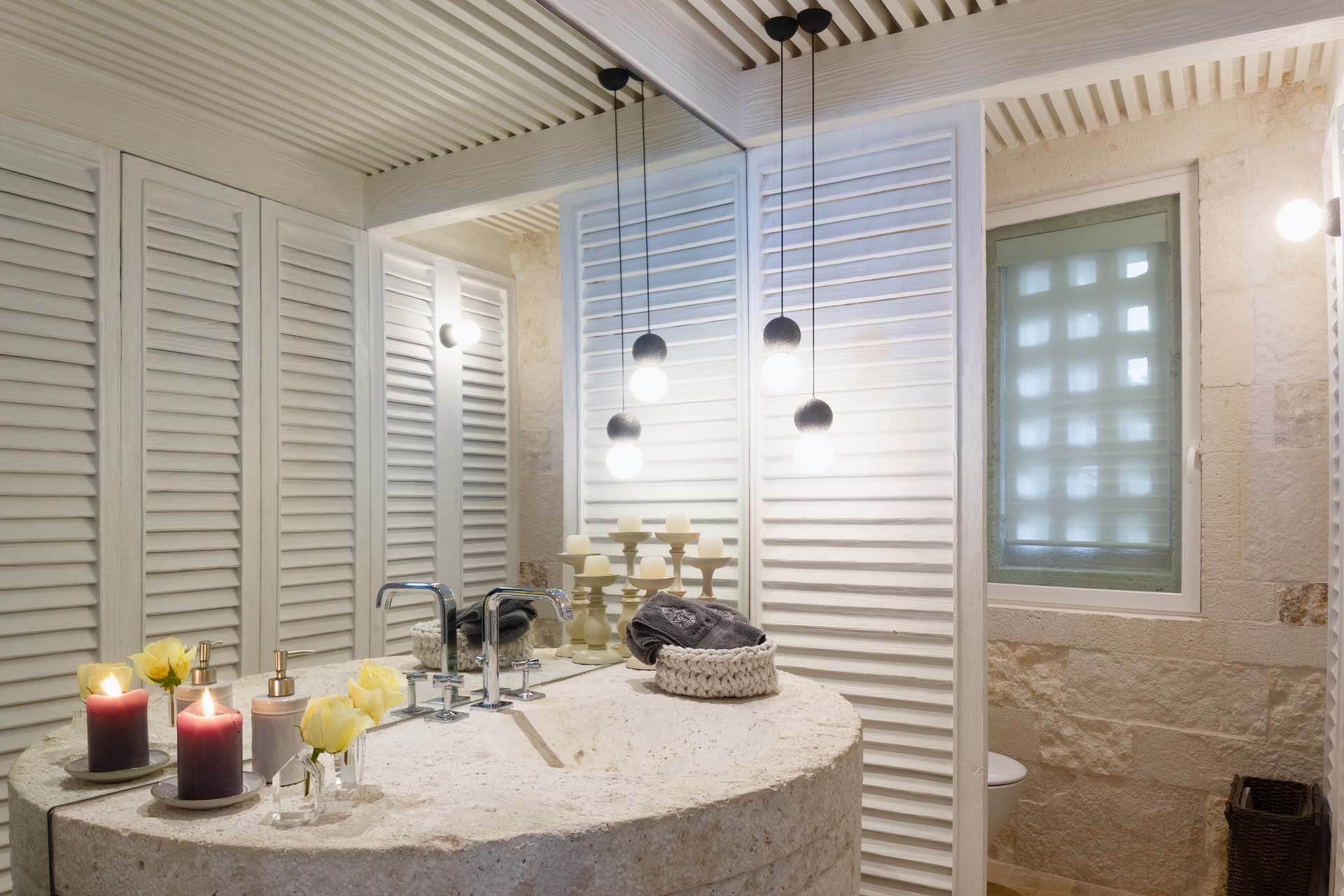 Soft light, natural stone, and timeless tranquility — Villa Sha turns every detail into art. | Luz suave, piedra natural y tranquilidad eterna — Villa Sha convierte cada detalle en arte.
