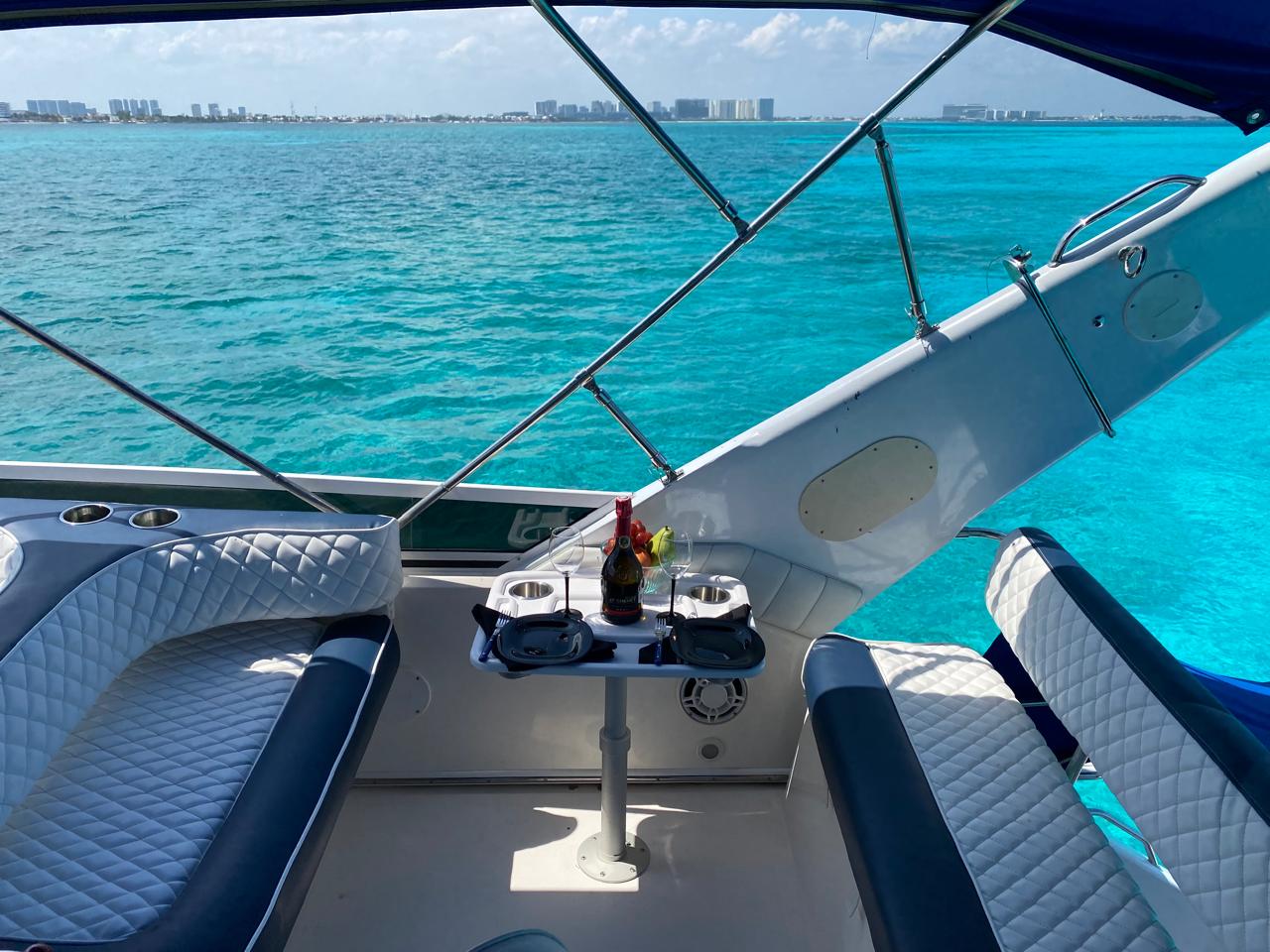 The flybridge table creates a relaxed place to enjoy drinks and Caribbean views