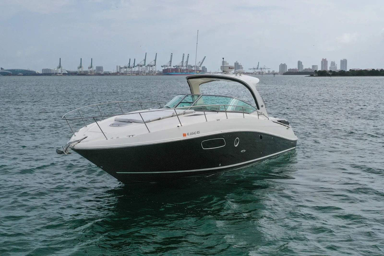Regina 40ft helm station and seating with Cancun ocean view