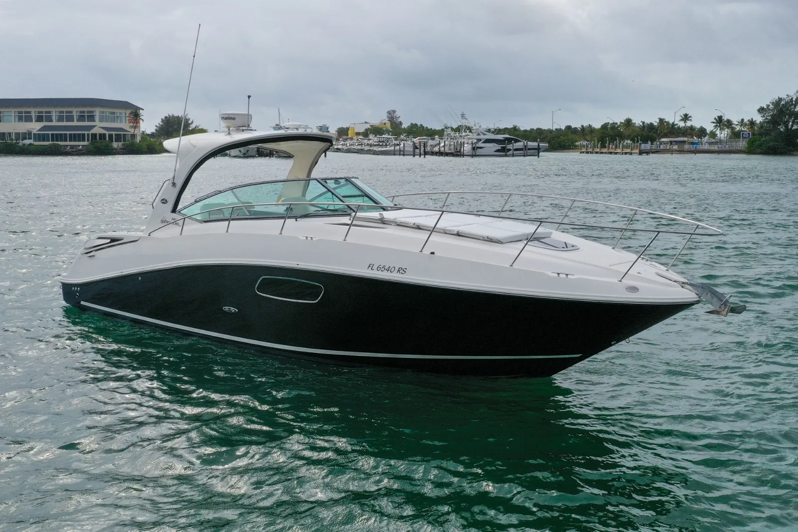 Regina 40ft aerial stern wake view cruising in Cancun