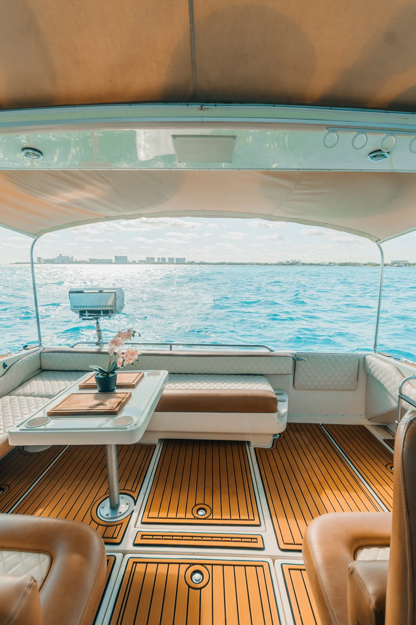 Covered aft lounge on Tata 40ft private yacht in Cancun