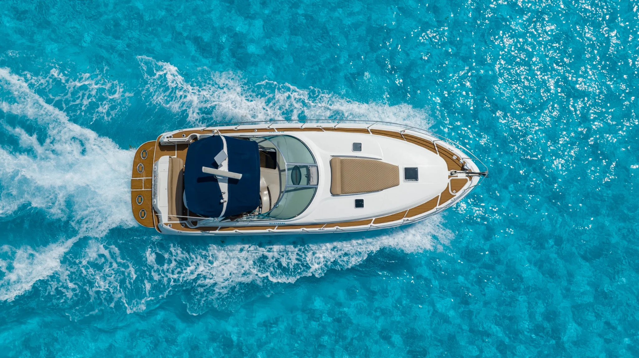 ATM 45ft yacht bow sundeck facing turquoise Cancun water