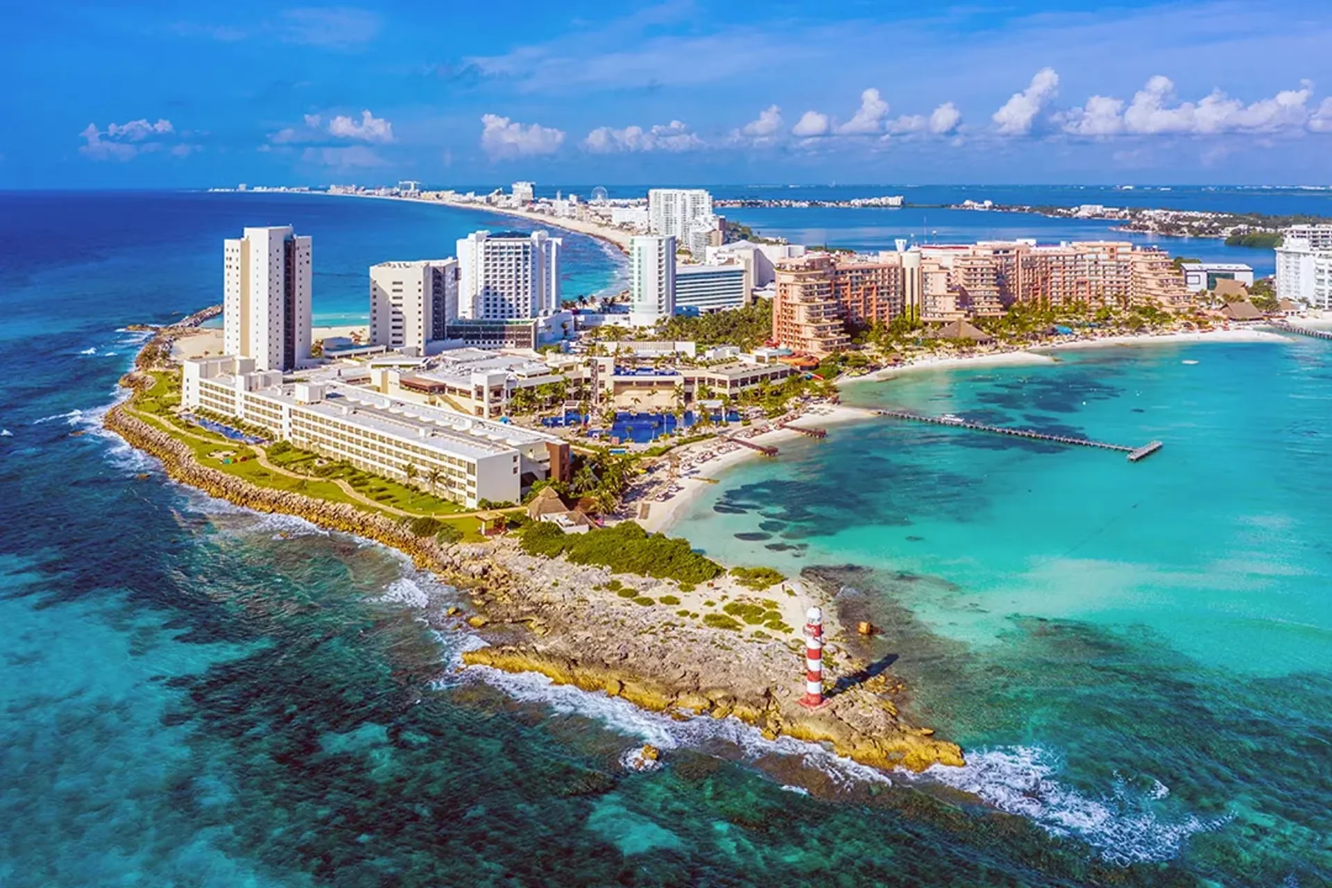 Aerial view of Cancún Hotel Zone and the turquoise Caribbean Sea.