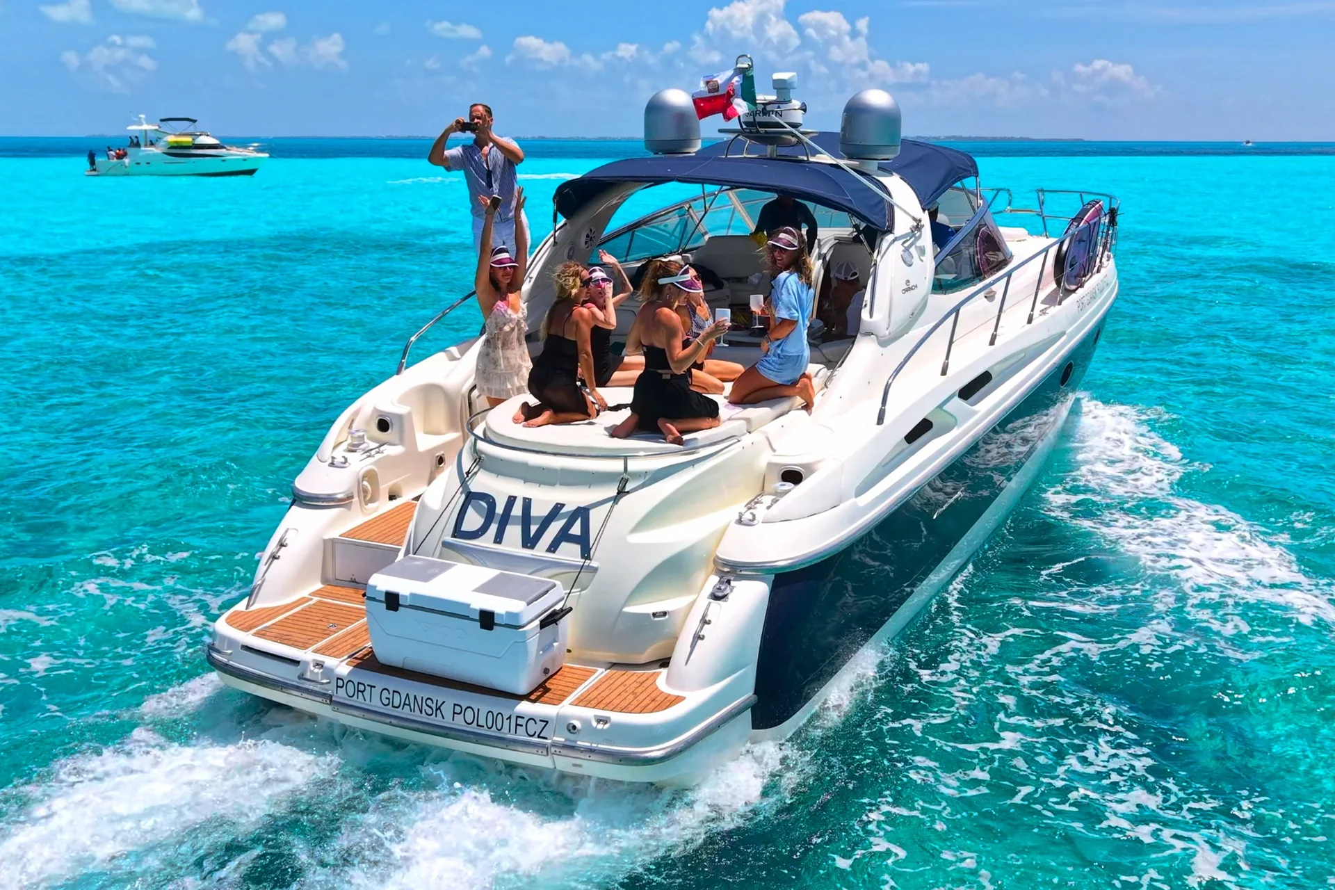 Guests enjoying a private yacht party on Diva 60ft in Cancun