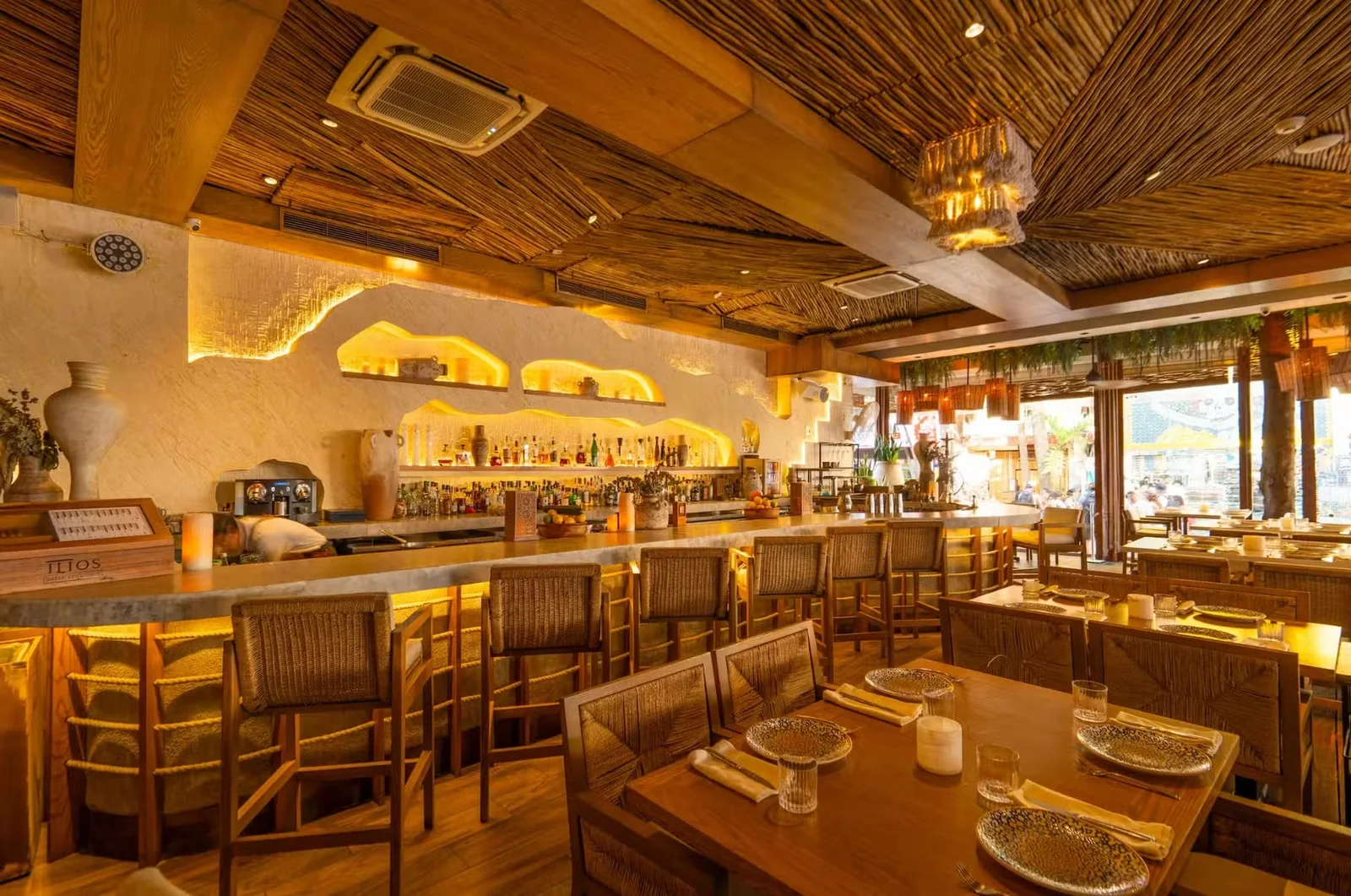 Bar and dining area at Ilios Greek Estiatorio Playa del Carmen