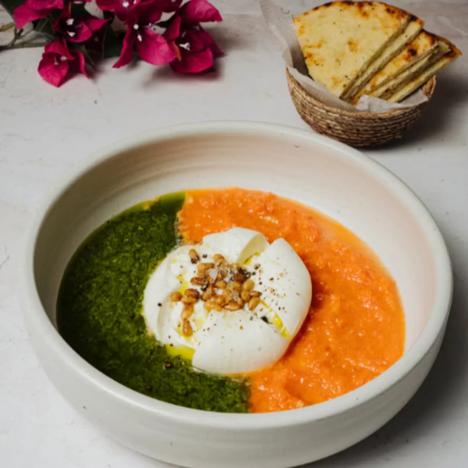 Burrata with red and green sauces at Ilios Greek Estiatorio Playa del Carmen
