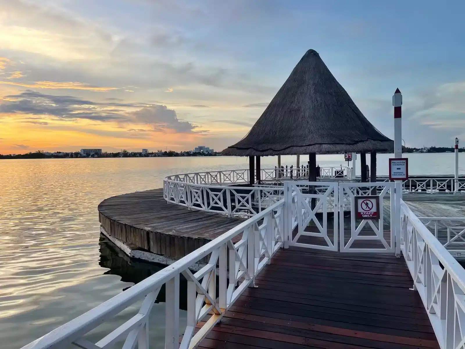 Lagoon dock sunset at Lorenzillo’s Cancun