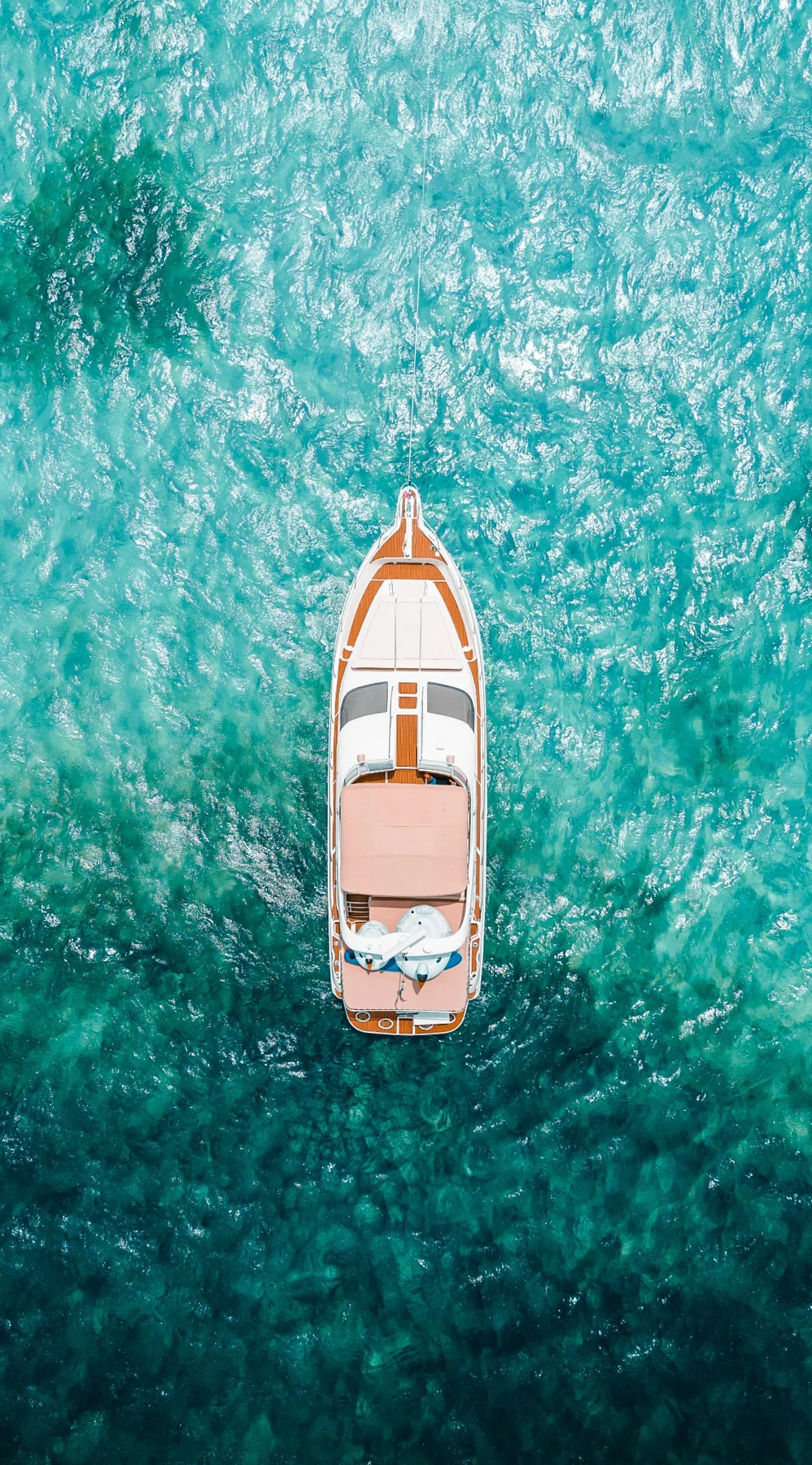 Aerial top view of Mr Sea 50ft yacht over turquoise water in
Cancun