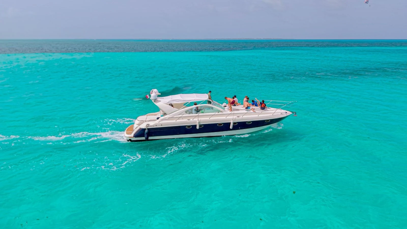 Wide aerial profile of the Nash 52ft yacht sailing across the Caribbean Sea near Cancun.