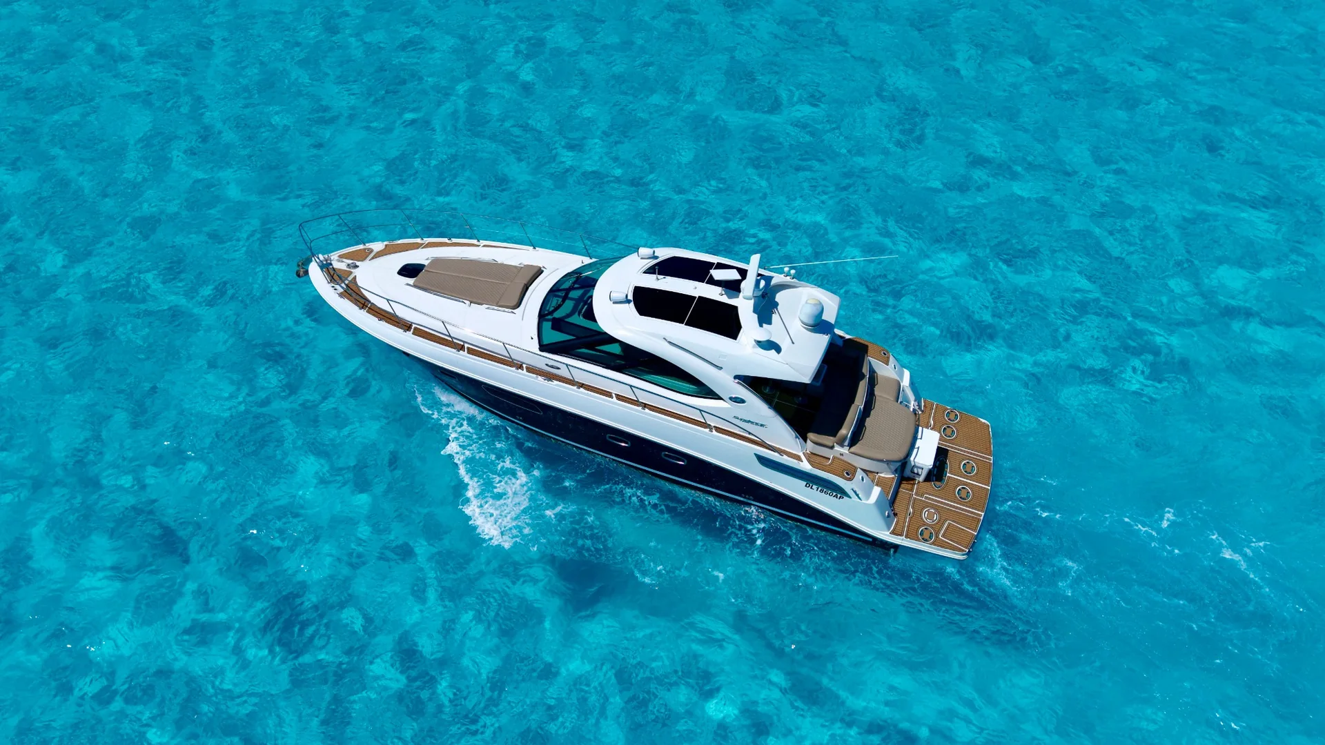 Octopus 48ft private yacht charter Cancun stern view on turquoise Caribbean water