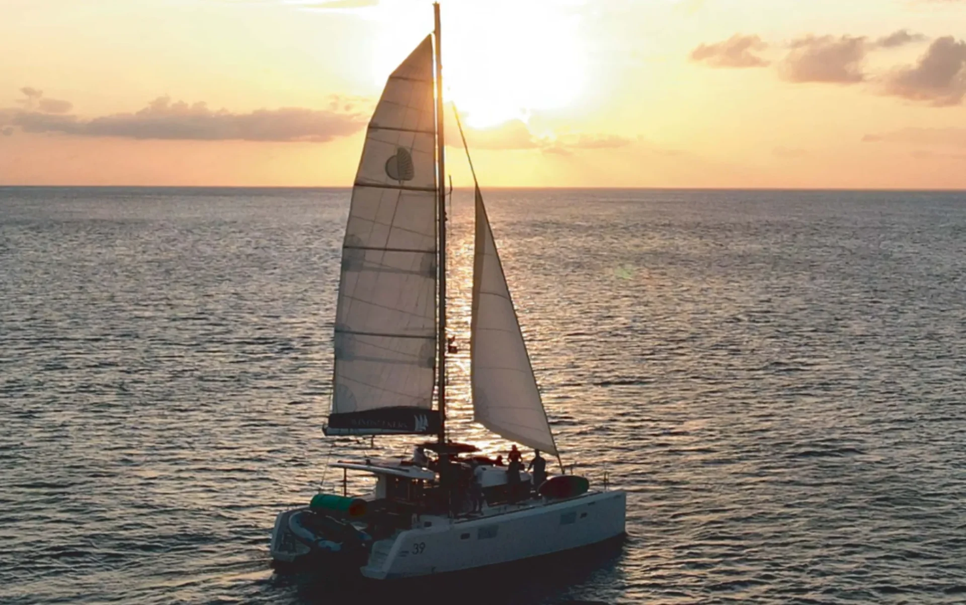 Lidia catamaran sunset sailing in Cozumel
