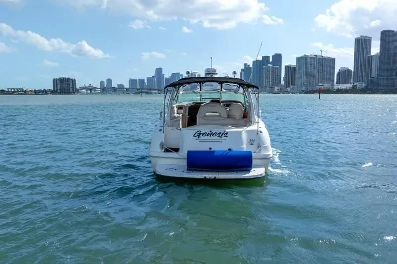 Stern view of Genesis 38ft private yacht on clear Caribbean water