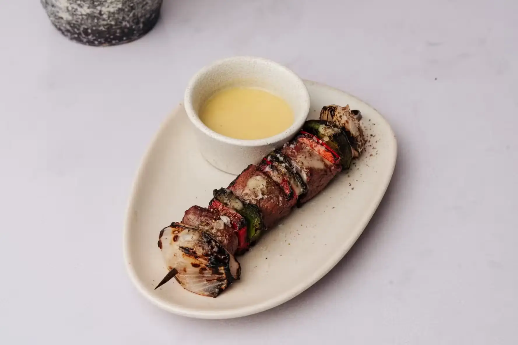Grilled octopus skewer at Ilios Tulum