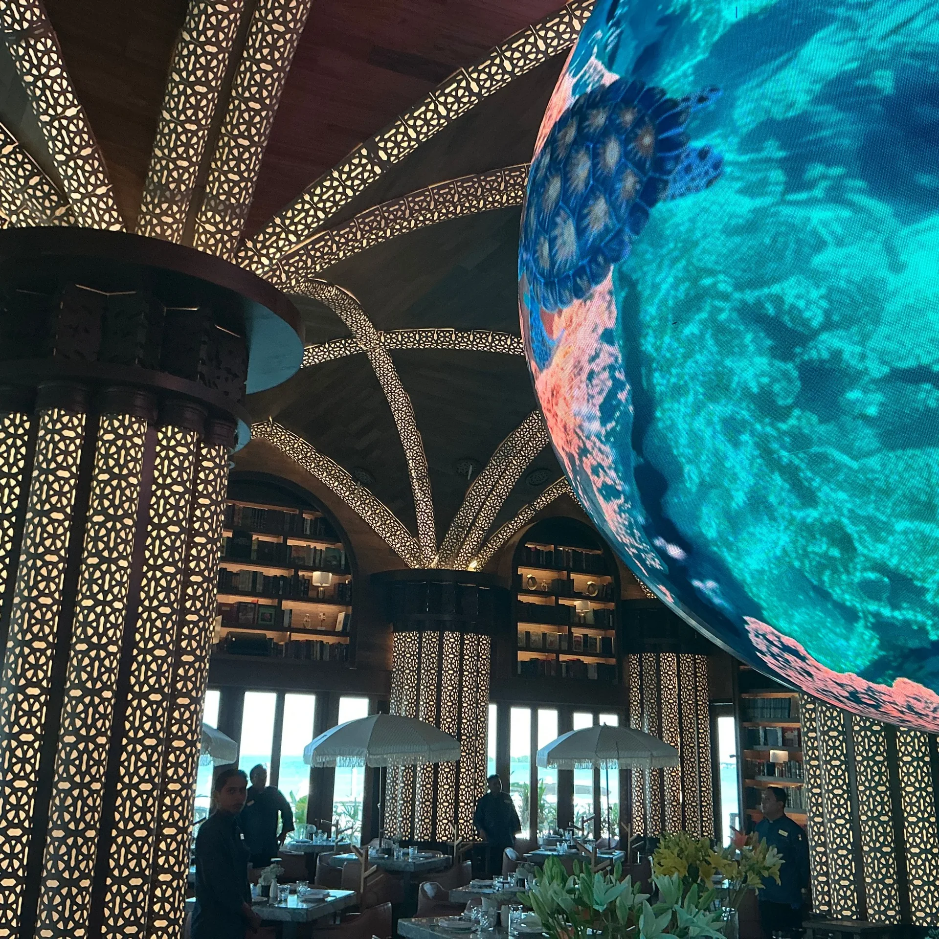 Immersive interior with digital globe at Cristina Cancun