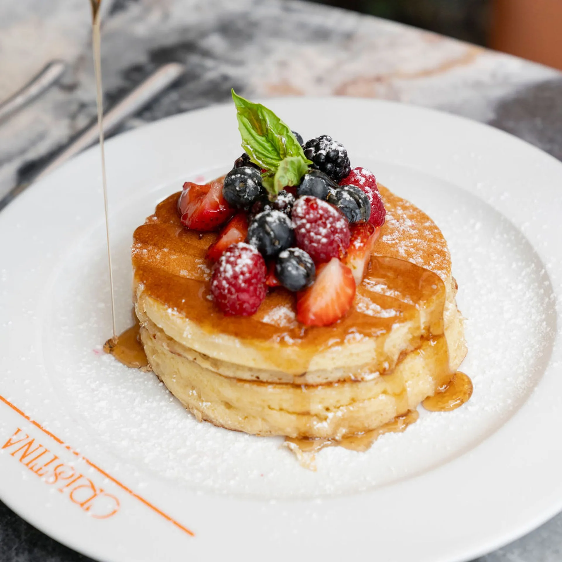 Pancakes with berries at Cristina Cancun