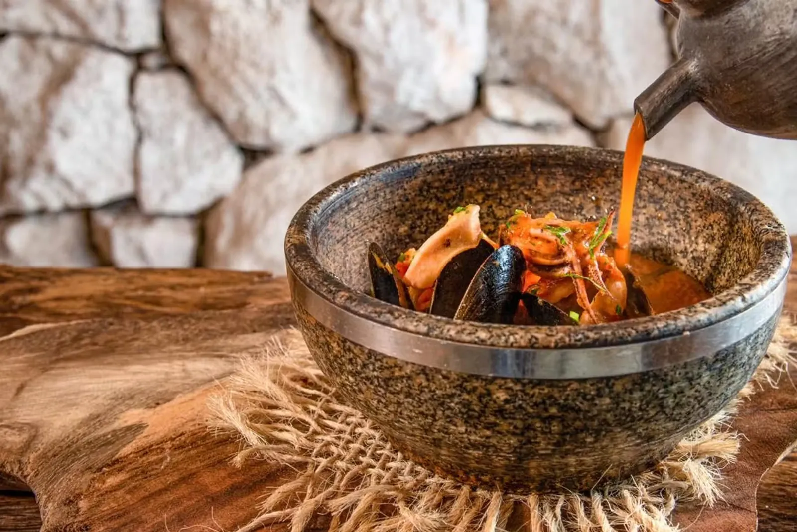 Seafood stew with mussels served at Taboo Cancun restaurant